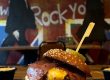 lvis Burger with double Angus beef patties, American cheese, turkey bacon, and truffle honey glaze at Band of Burgers restaurant in London